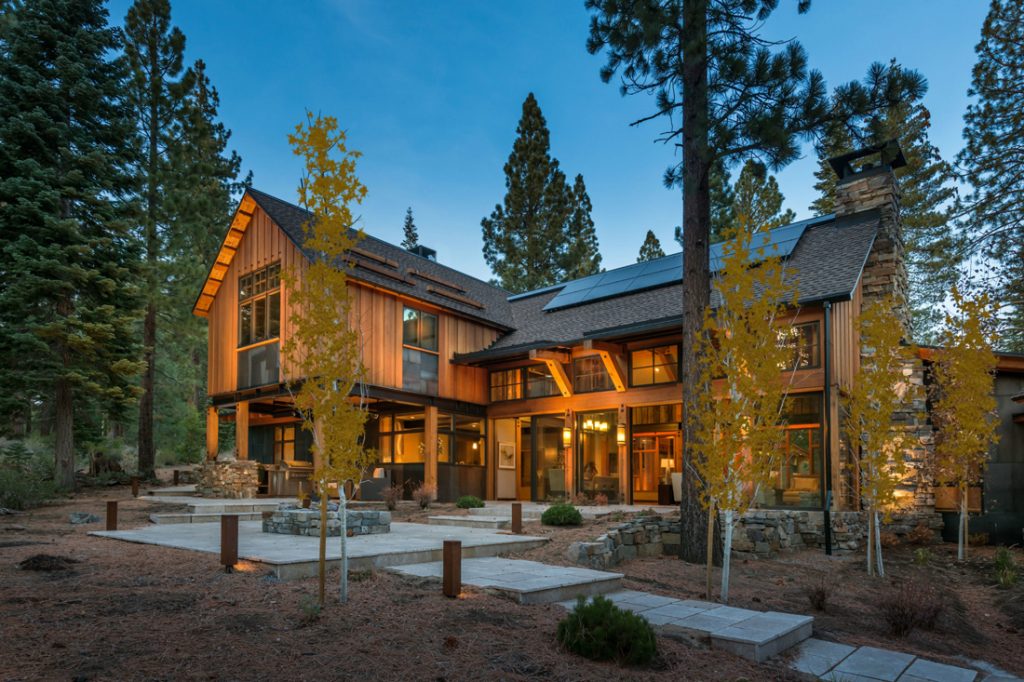 Cabin in the woods with solar panels on the roof
